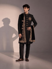 Black silk indowestern for men with gold crest embroidery and embroidered velvet stole - front view
