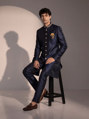 Dark navy silk indowestern for men - seated pose