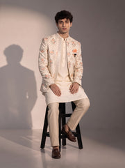 Ivory peach floral jodhpuri indowestern suit for men - seated pose