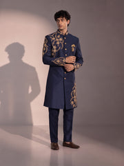 Navy blue silk indowestern for men - side view with gold embroidered cuffs