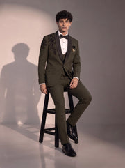 Olive floral embellished tuxedo suit for men - seated pose