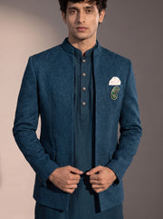 Teal blue textured jodhpuri indowestern suit for men - close-up of collar and embroidery